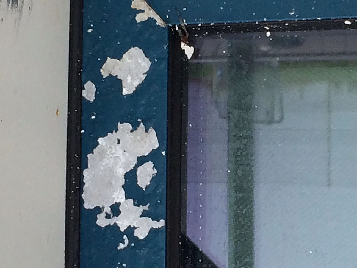 corroded window frames needing repair