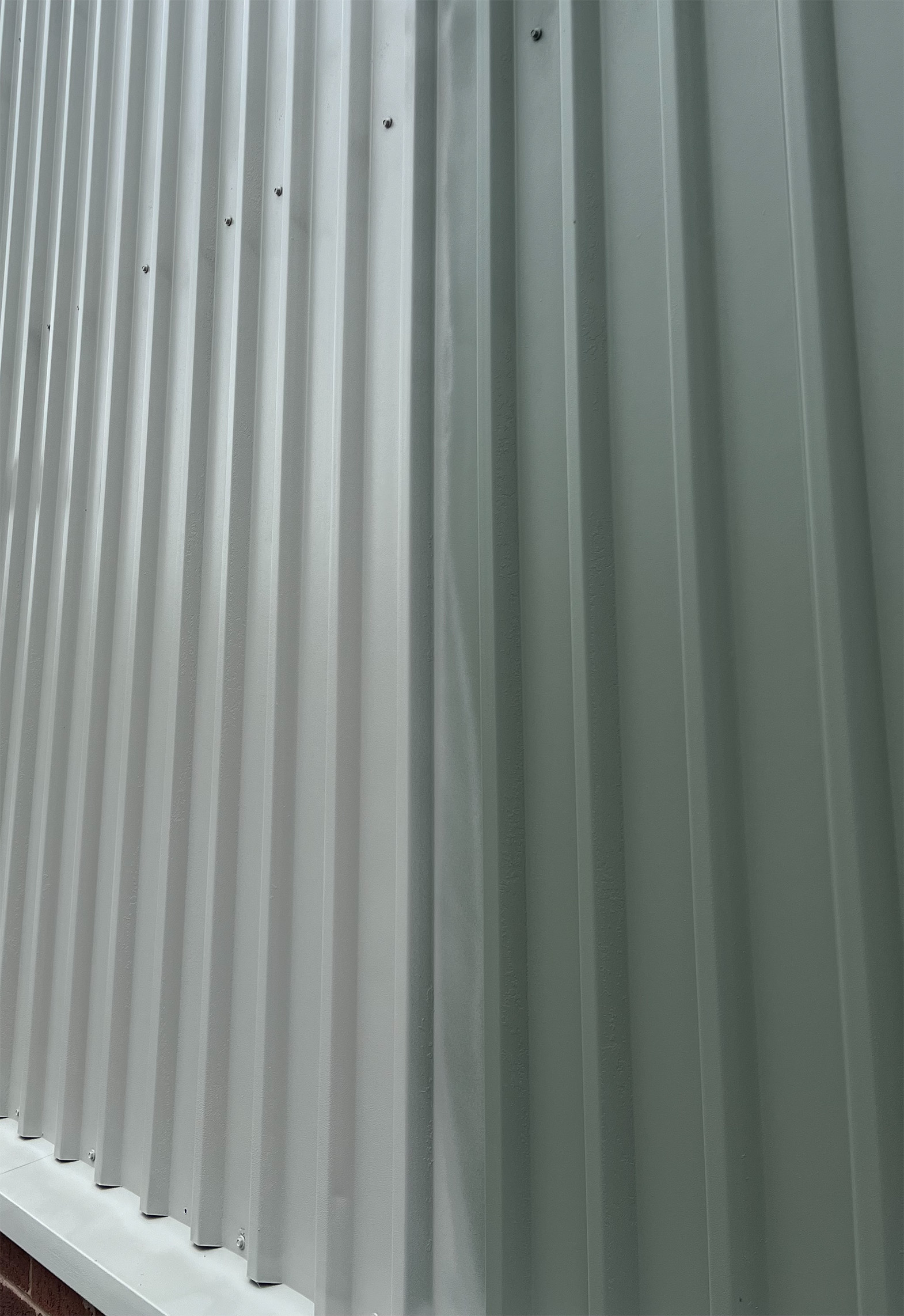 Cladding coating in progress grey green base goosewing grey top coat