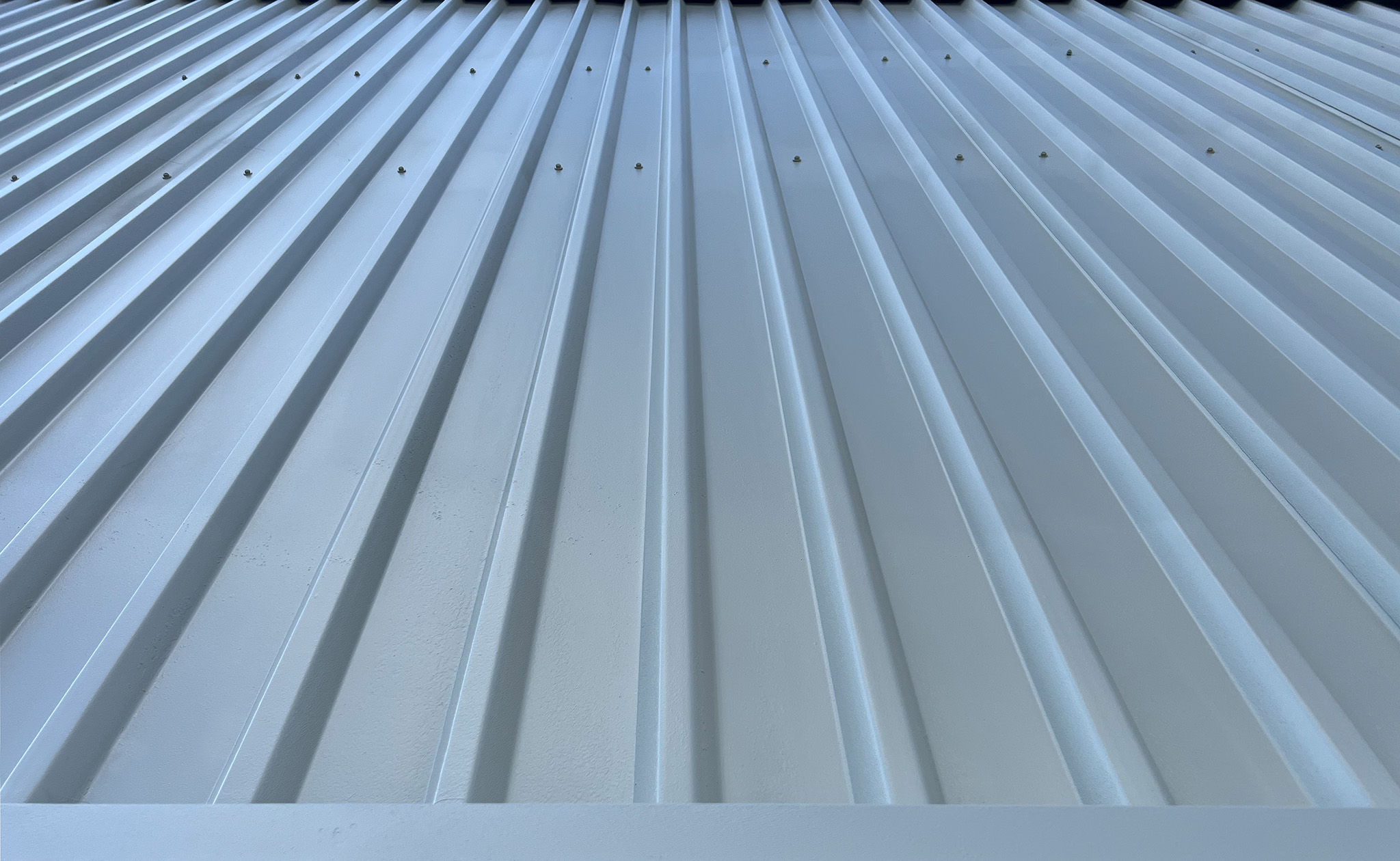 Newly coated steel wall cladding goosewing grey