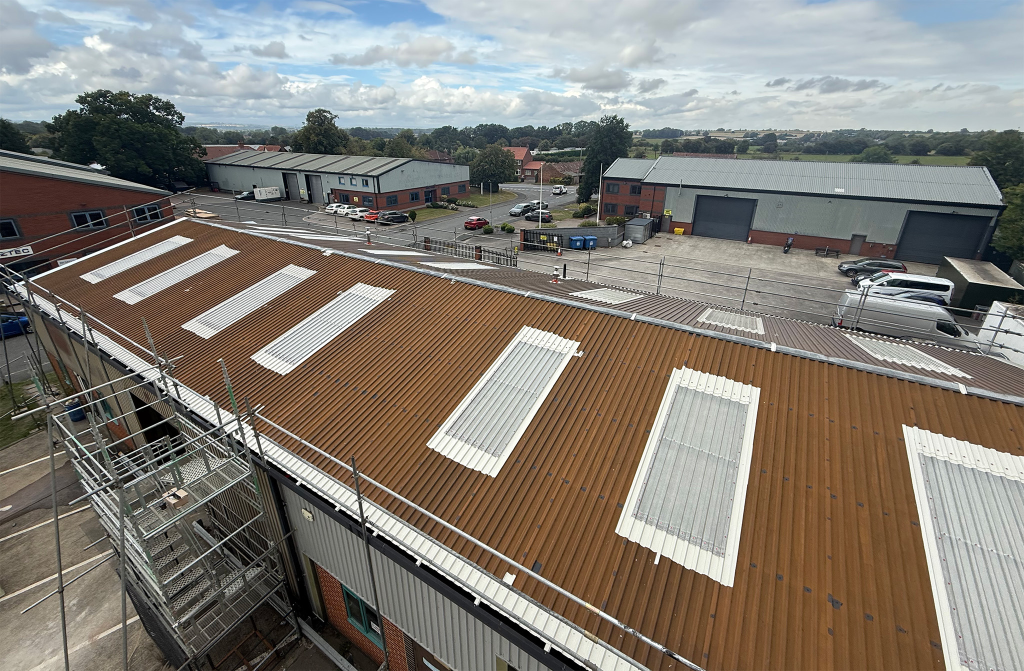 Close up of a completed DriSilane ReCote roof coating on corrugated steel sheeting