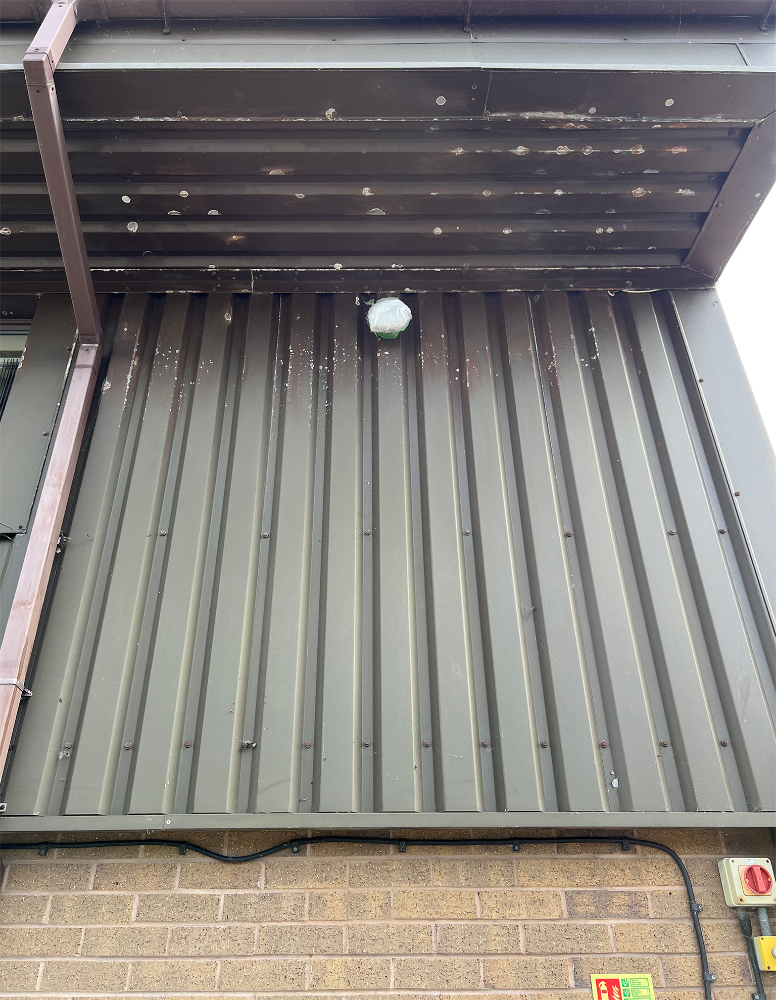 Completed sanding preparation on soffit trims and upper wall cladding