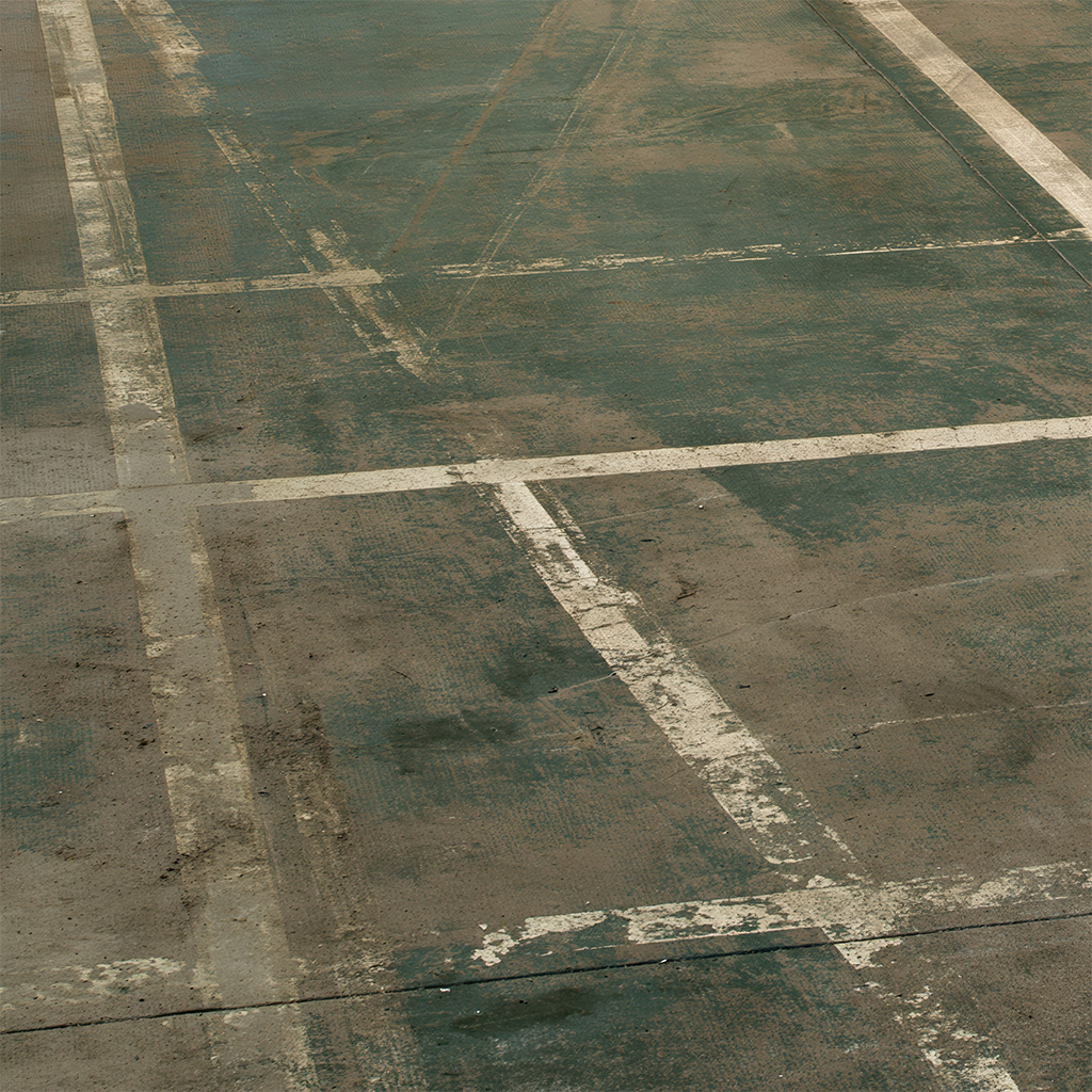 previously coated warehouse floor worn through traffic lanes